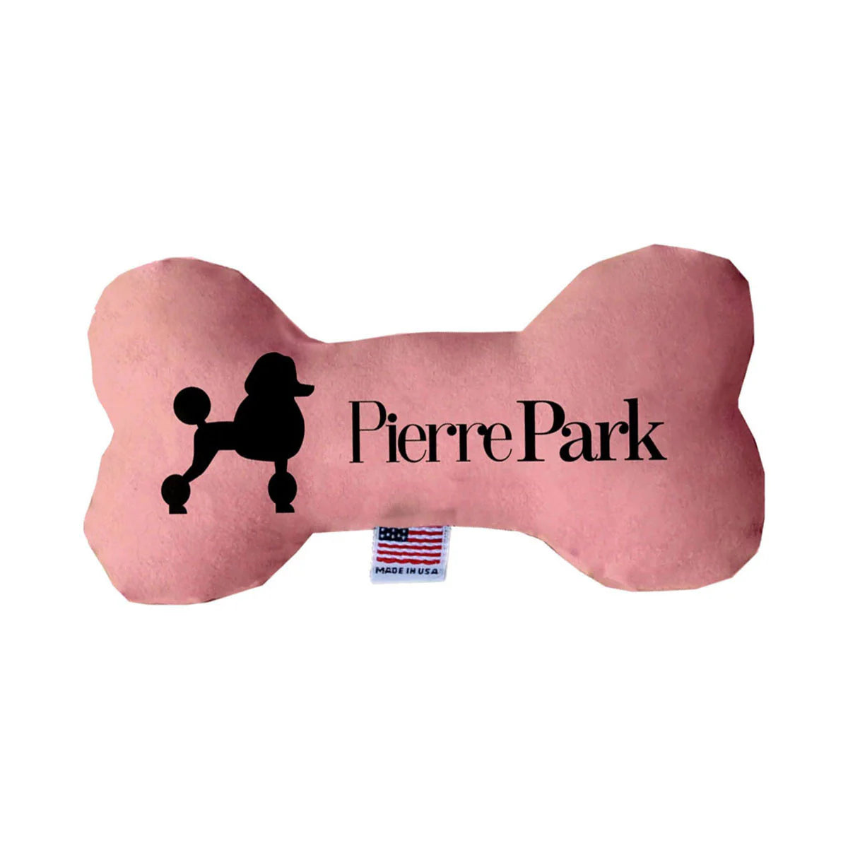 The Pink Dog Bone Toy - Classic Pink from PierrePark features a black silhouette of a poodle and logo, with an American flag tag at the bottom.