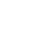 Silhouette of a dog standing and eating from a bowl.