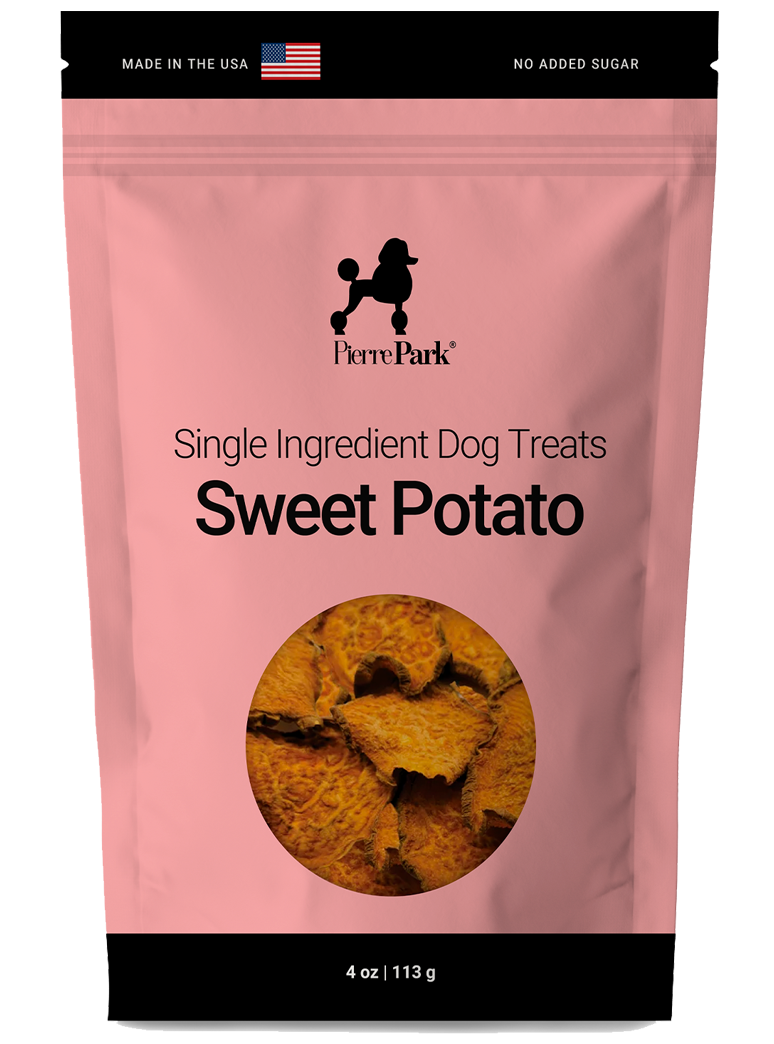 A pink package labeled Pierre Park Single Ingredient Dog Treats with a circular window showing dried sweet potato slices inside. Text notes Made in the USA and No Added Sugar. Weight is 4 oz (113 g).