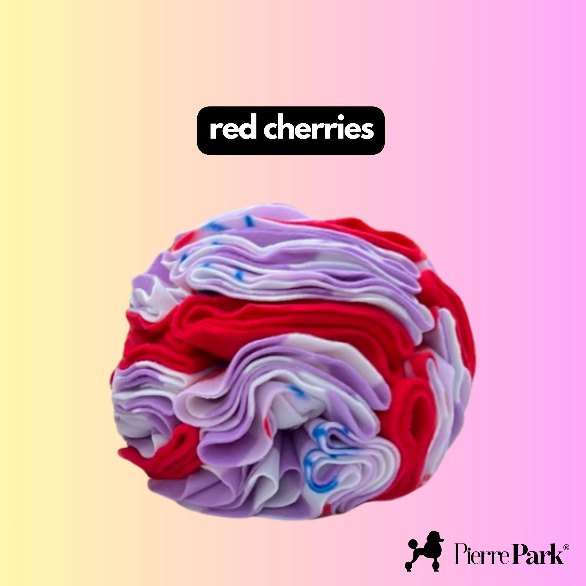 Snuffle ball for dogs by PierrePark in vivid shades of red, white, and purple, labeled 'red cherries' against a pastel yellow and pink background. This toy enriches playtime by encouraging sniffing and searching activities.