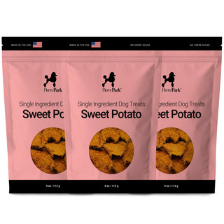 Three-pack of sweet potato single ingredient dog treats by PierrePark in a pink bag, labeled Made in the USA with No Added Sugar, showing visible product slices through a transparent window.