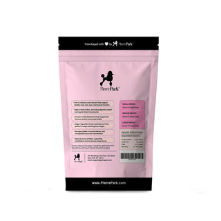 Back view of a PierrePark butternut squash hypoallergenic dog treats package in pink, displaying nutritional information and feeding guidelines for small, medium, and large breeds. The package highlights benefits such as no sugar added and high in dietary fiber, along with the brand's website, www.PierrePark.com, and contact details.