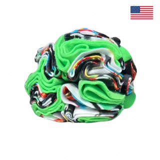 Green Games snuffle ball for dogs on a white background with a small American flag in the upper-right corner.